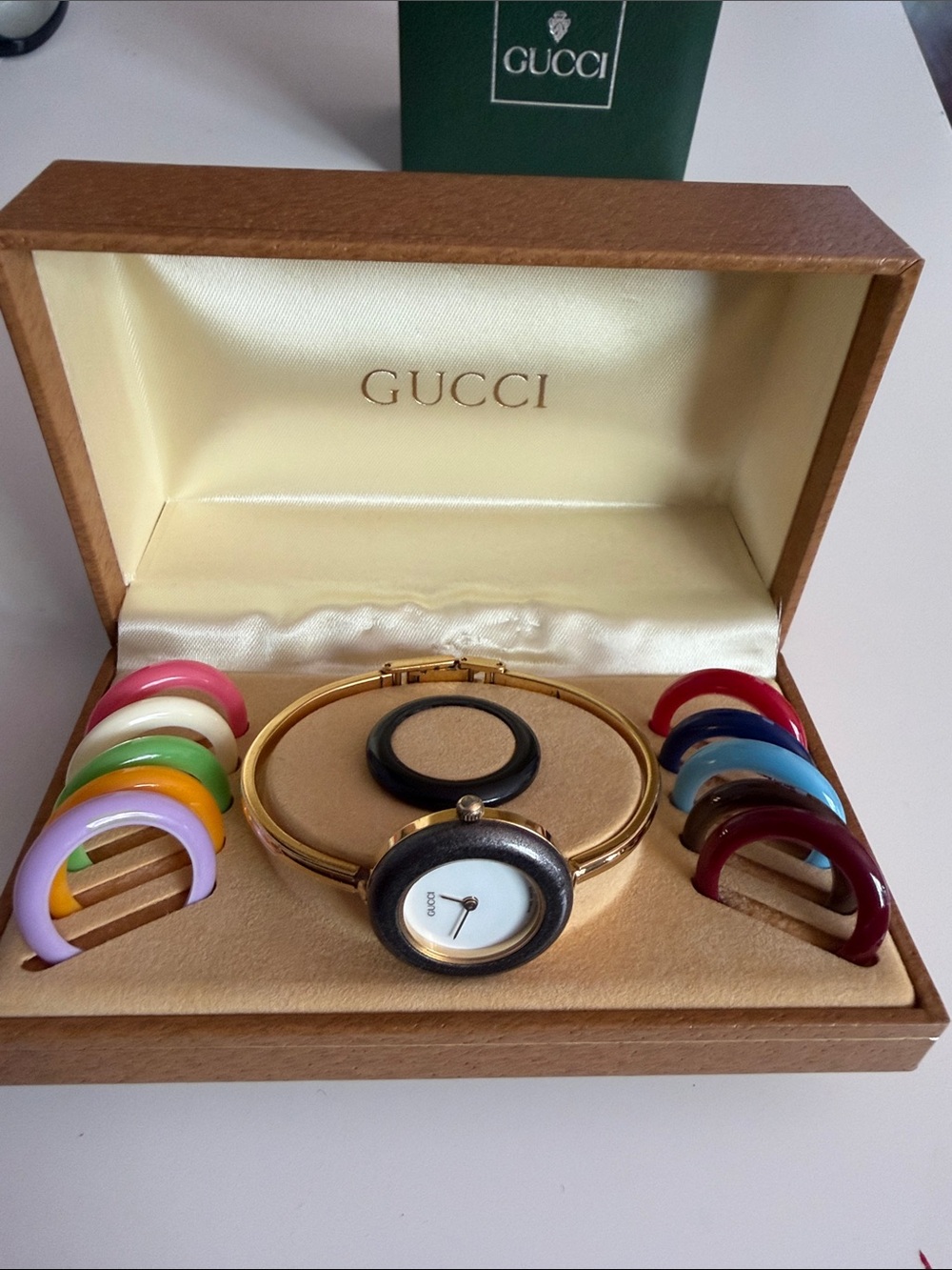 Gucci Gold Bangle Watch with Interchangeable Multicolor Bezels